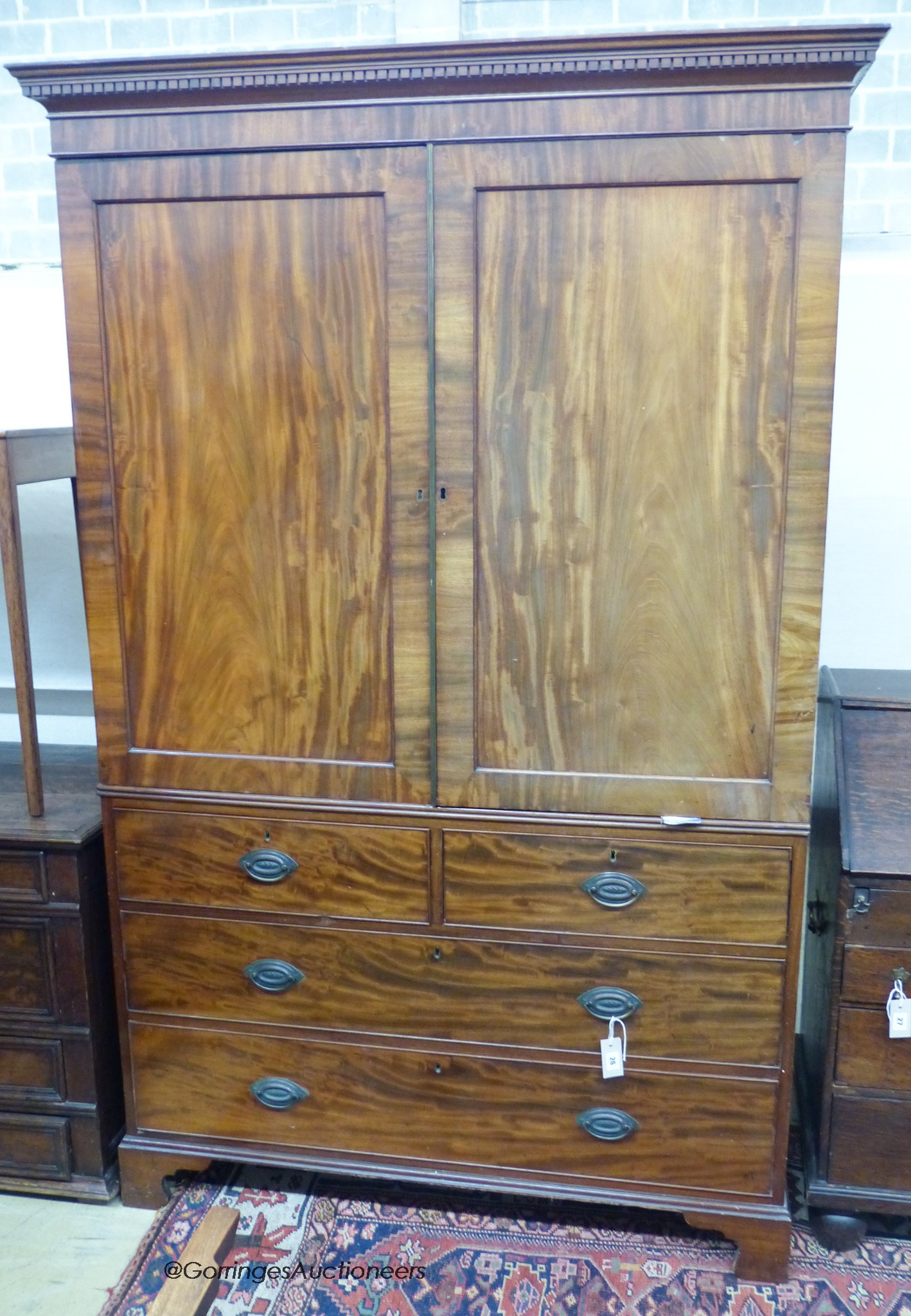 A George III mahogany linen press